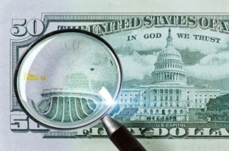 Preventing the Use of Counterfeit Money Using Quantum Physics