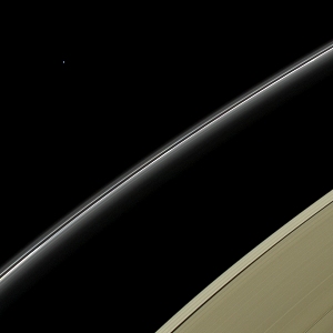 Cassini Captures Image of Ice-Giant Planet Uranus Beyond Saturn's Rings