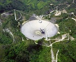 Arecibo Radio Telescope Discovers Split-Second Burst of Radio Waves from Deep Outer Space