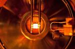 Lithium Coatings Applied to Walls of Fusion Facilities Could Improve Plasma Performance