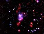 Astronomers Determine Mass of Very Young, Distant Galaxy Cluster