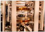 Novel Trap Captures Atoms along Ultra Thin Glass Fiber for Future Quantum Computer Networks