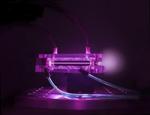 Subatomic Particles Accelerated to Record High Energies in Compact Laser-Plasma Accelerator