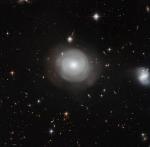 Hubble Captures Ghostly Shells of ESO 381-12 Galaxy