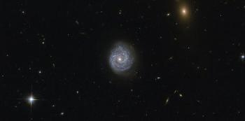 NASA’s Hubble Space Telescope Gazes into Beautiful Spiral Galaxy in Virgo Constellation