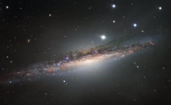 Galaxy NGC 1055 Displays Odd Twists in Structure
