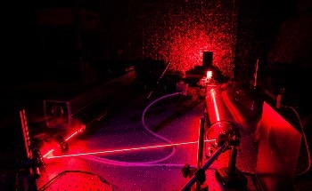 Tailor-Made Laser Light Fields can Reduce the Speed of Particles